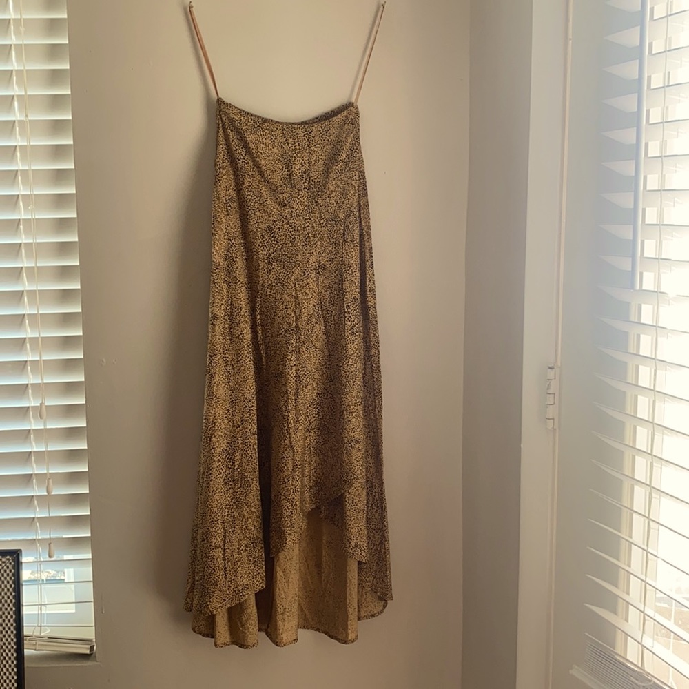 Brown/Tan Cheetah Print Skirt Band New. Midi Skirt. XS .